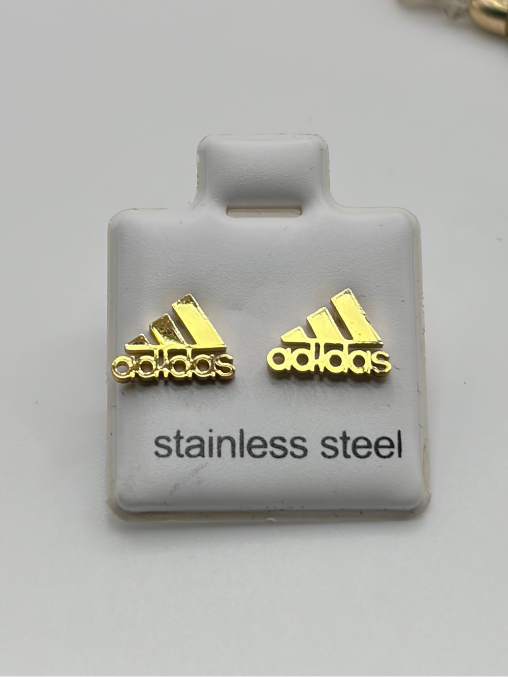 Gold Unisex Logo Stud Earrings